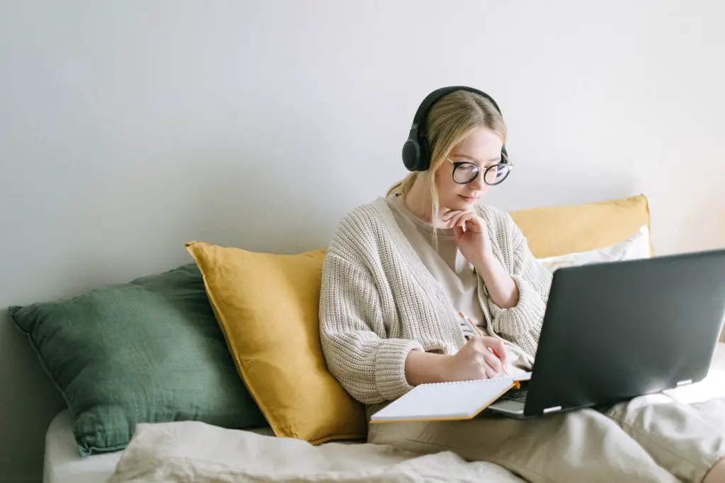 women taping on computer